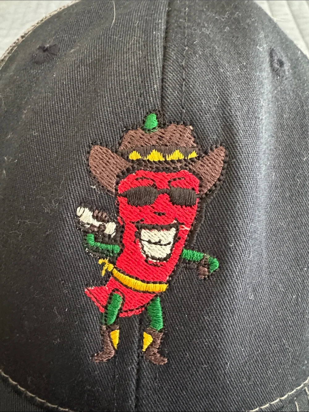 Men’s Black Trucker Hat with cowboy chili